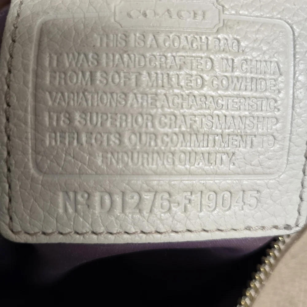 Coach moderately used